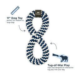 Dog playing tug with Tall Tails navy infinity toy during outdoor fetch