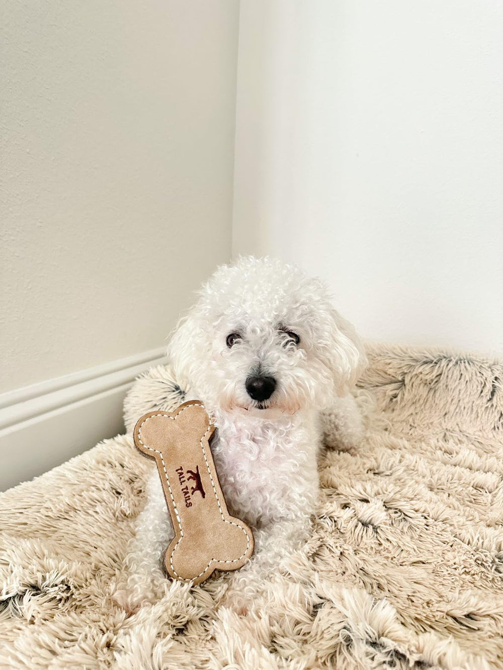 Tall Tails tug-of-war scene; promotes interactive play with supervision.