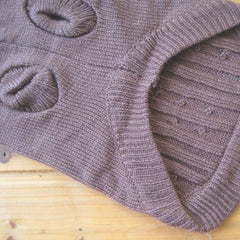 Tangpan Turtleneck brown fabric closeup highlights elastic knit and soft texture