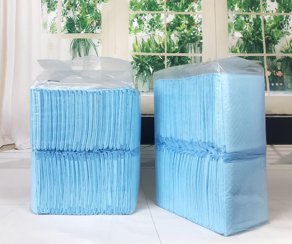 TBM Puppy Pads absorbent layer shown to lock moisture during potty training.