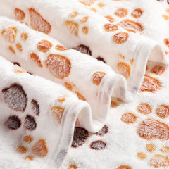 Tegeme double-sided fleece blanket folded in a crate for easy bedding.