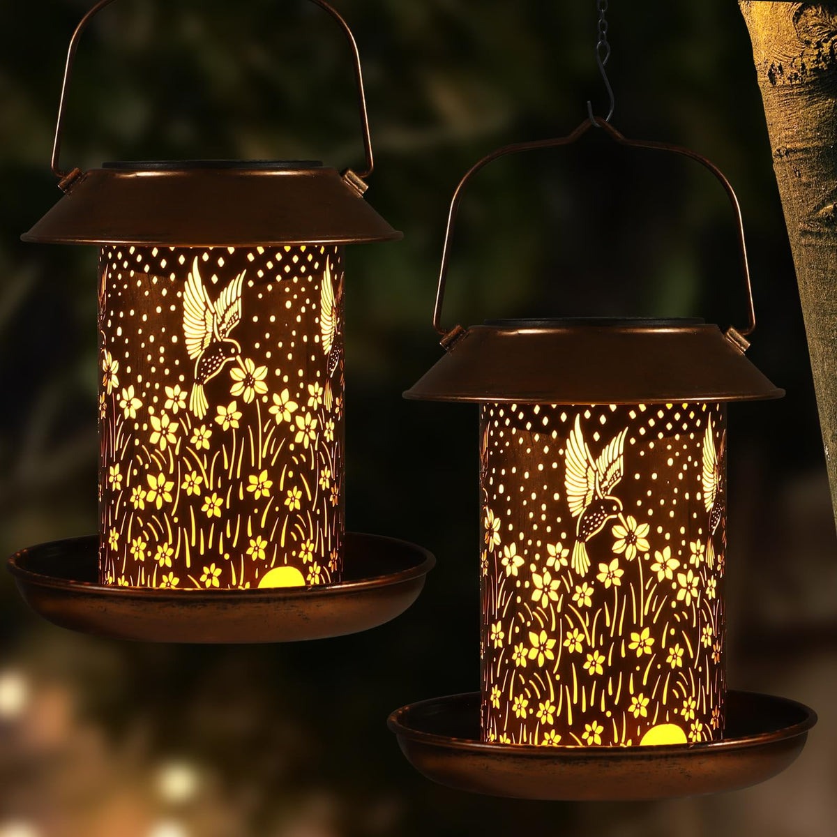 Tepaken bird feeder solar-lantern hummingbird pattern lights up the garden at night.