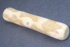 THATUWOOD Coffee Wood Chew Stick closeup texture—natural wood grain and sturdy construction.