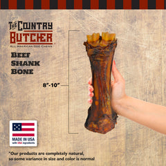 The Country Butcher beef shank dog bones close-up texture demonstrates rugged, long-lasting chewing appeal.