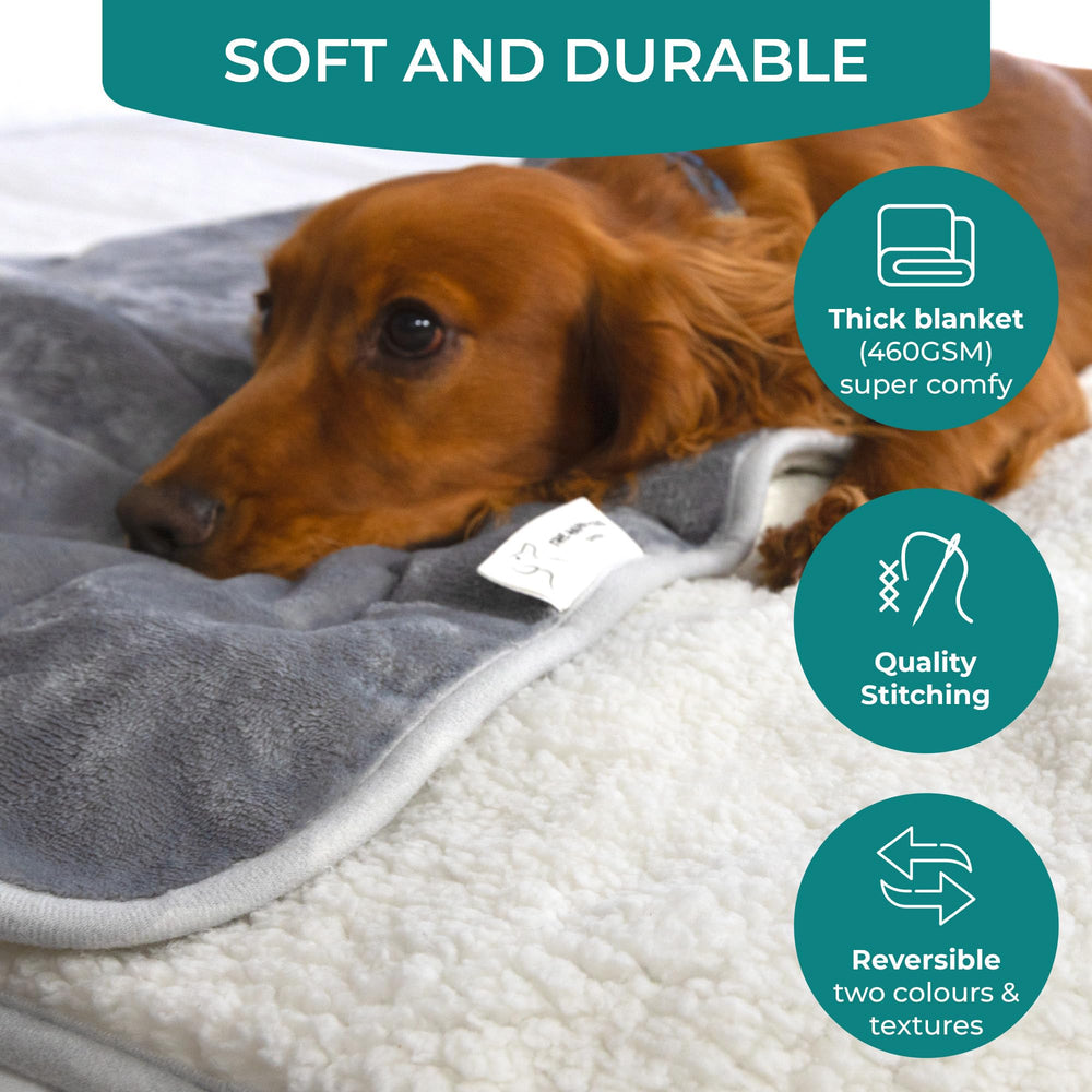 The Happy Dog Company manta reversible con Sherpa suave para mayor comodidad.