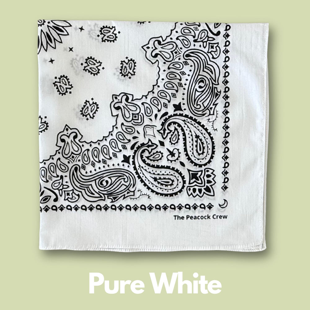 The Peacock Crew Iconics bandana worn as a head scarf showcasing versatile styling.