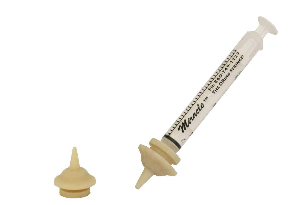 The Miracle Nipple Mini Pack with two nipples and syringe for gentle newborn animal feeding support.