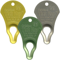 The Tick Key Original Pack Multi-Color used to detick a pet during outdoor play.