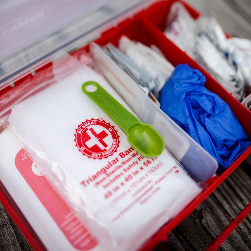 TickCheck compact kit ready for on-the-go tick prevention attached to gear.