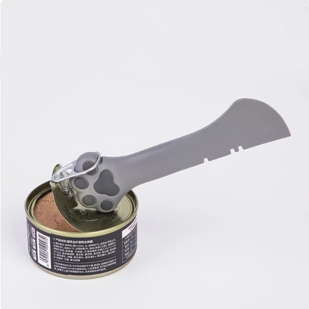 TidyNuts paw-pattern spoon in grey promotes comfortable grip during feeding.