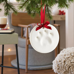 Tiny Ideas paw print ornament kit rolling pin helps shape clean, precise impressions.