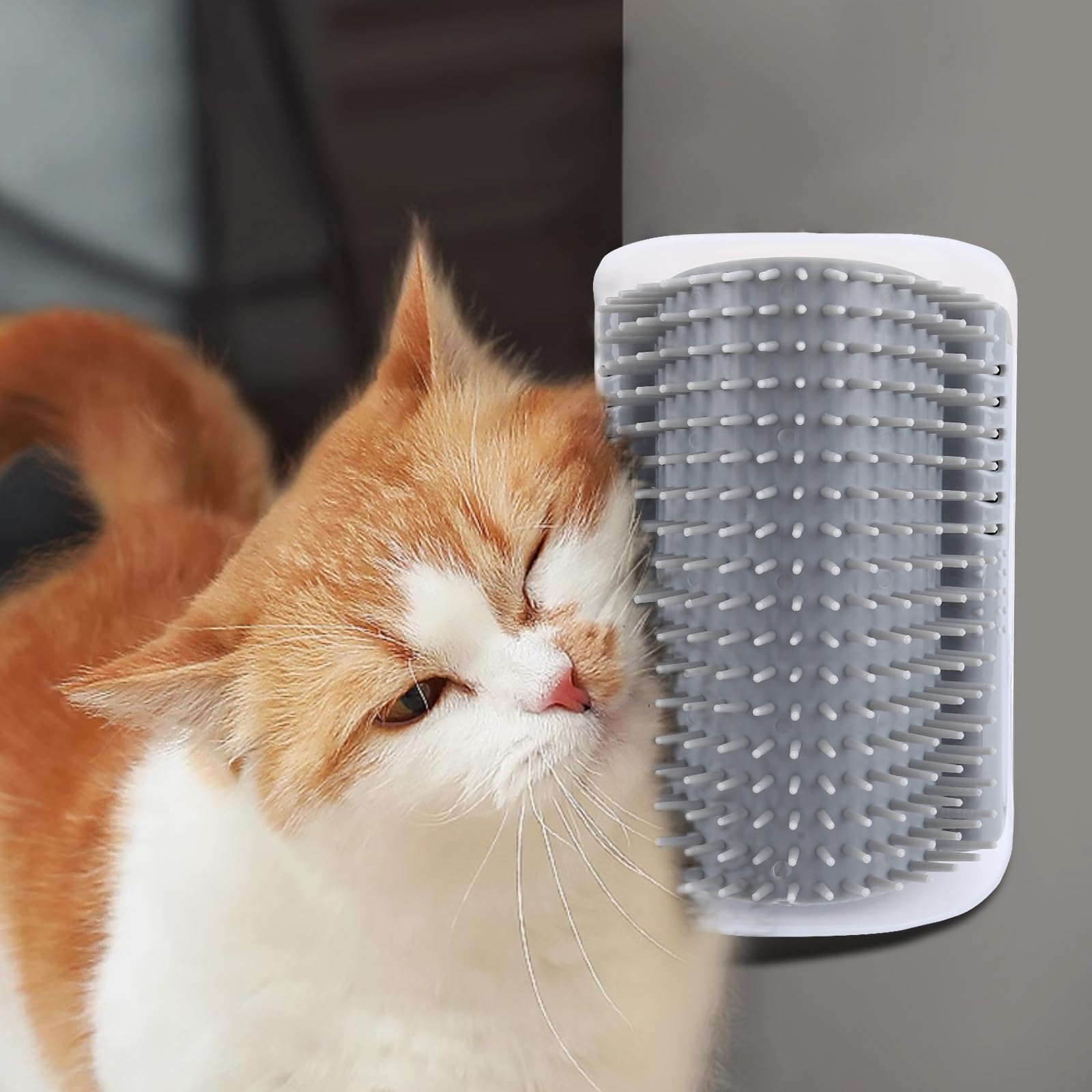 Tiny Pets grey self-groomer in-use with cat enjoying brushed relief near corner.
