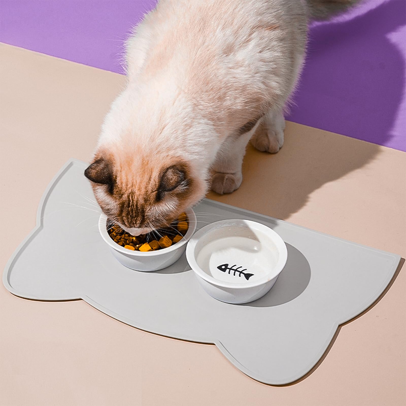 TOKAYIFE Cat Food Mat raised edges contain food and liquids.