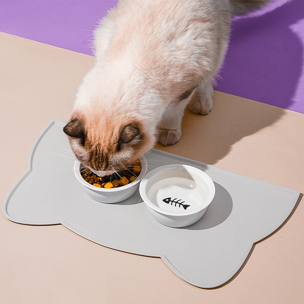 TOKAYIFE Cat Food Mat raised edges contain food and liquids.