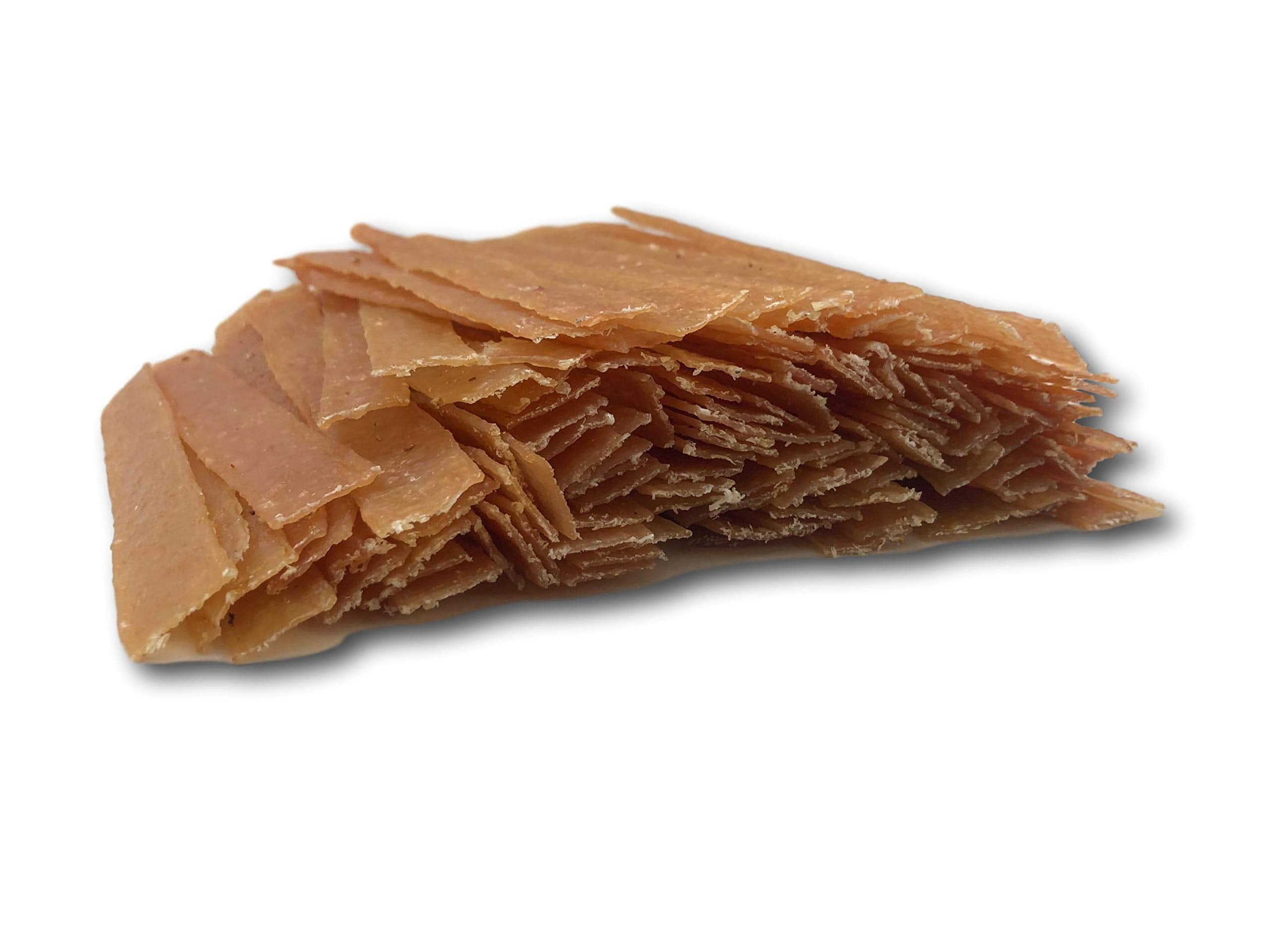 Top Dog Chews flat turkey tendons training session — high-protein reward for puppies and dogs.