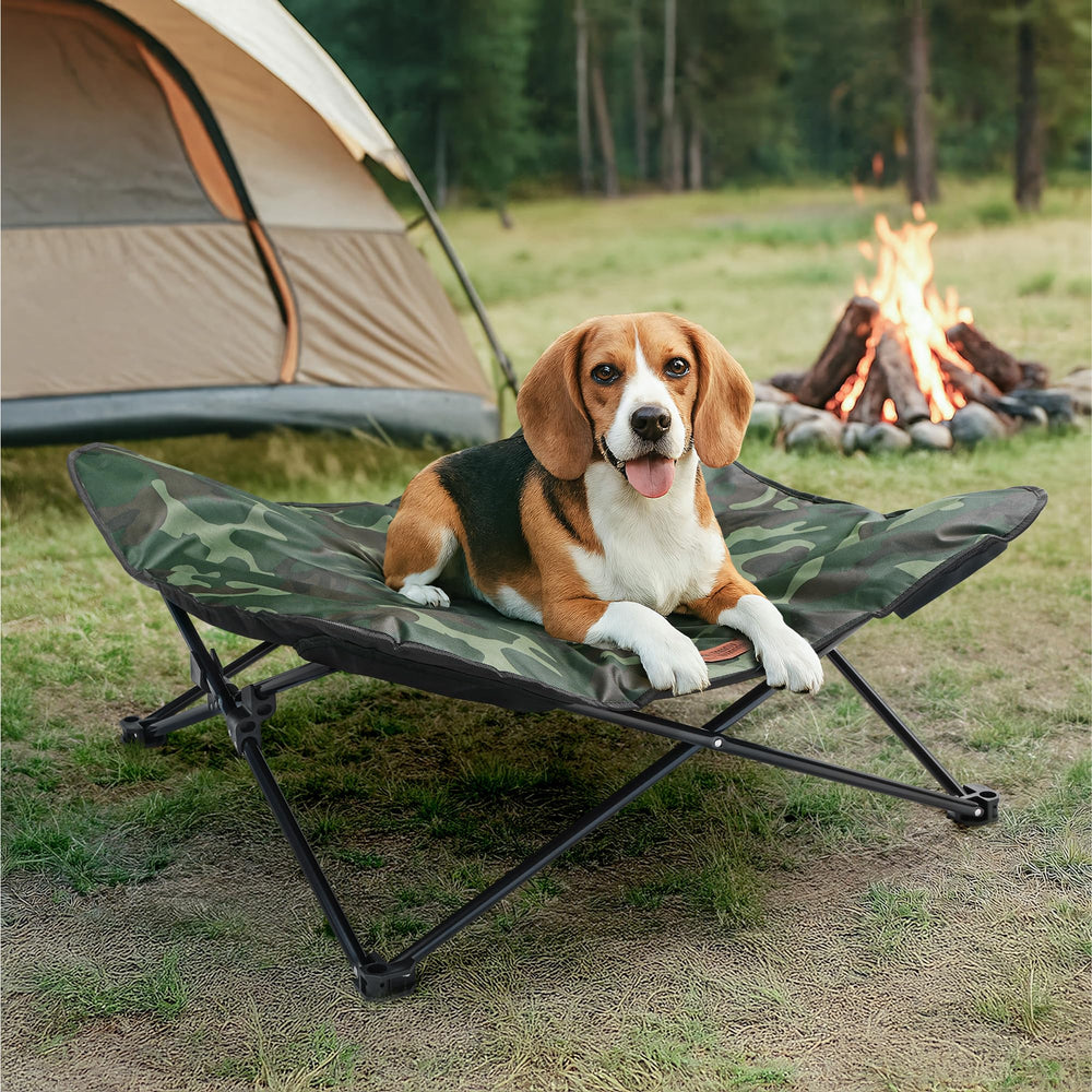 Tough Outdoors foldable dog chair in camo green, ready for camping with elevated rest