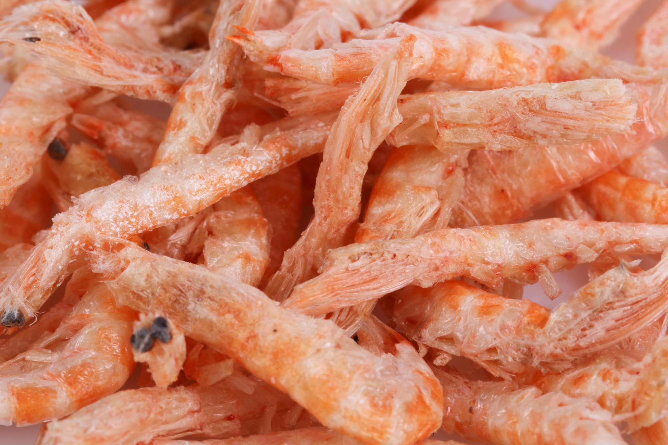 Toyuto premium freeze-dried krill shrimp mix closeup shows vibrant fish color.