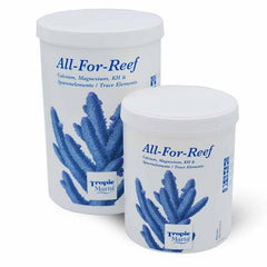Tropic Marin All-For-Reef Powder dosing in tank illustrates easy supplementation for corals.