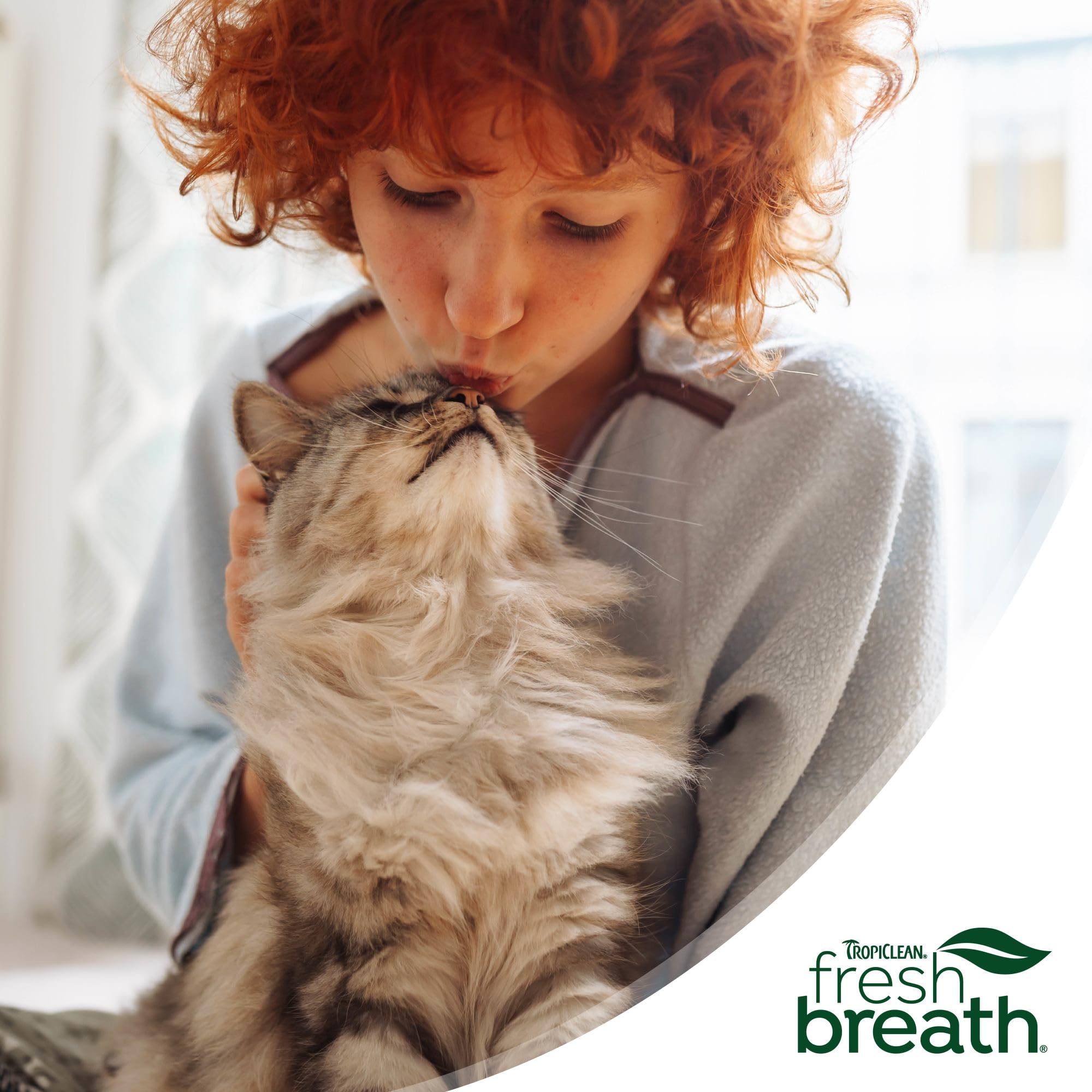 TropiClean dental water additive packaging on shelf communicates complete oral care routine