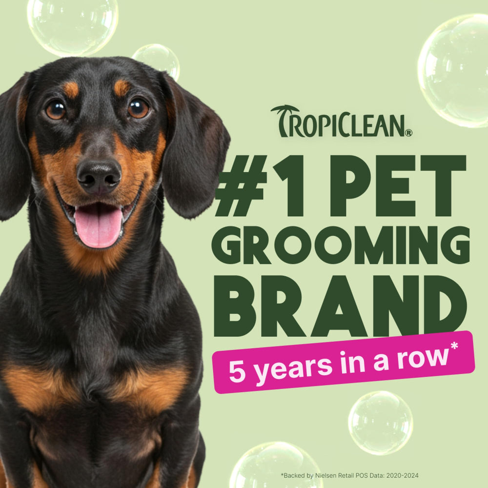 TropiClean deodorizing dog shampoo ingredients—oatmeal, chamomile, vitamin E for gentle coat care.