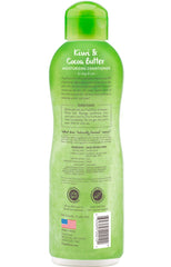 TropiClean dog conditioner label close-up emphasizing pH balanced and paraben-free formula