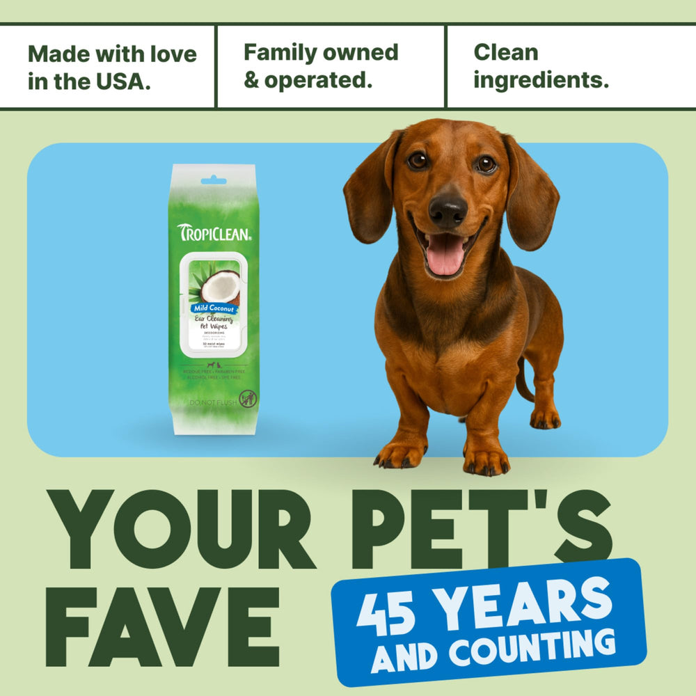 TropiClean dog ear wipes bottle beside tip card—pair with ear wash.