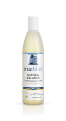 TrueBlue Natural Balance dog shampoo bottle with tearless cleansing formula.