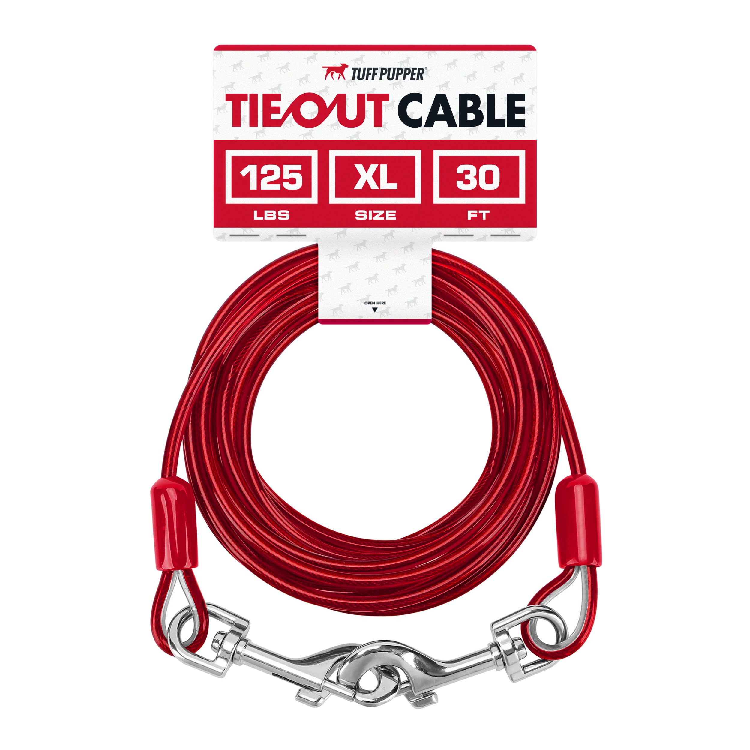 Tuff Pupper dog tie-out cable 30ft stretched between trees for safe yard exploration.