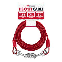 Tuff Pupper dog tie-out cable 30ft stretched between trees for safe yard exploration.