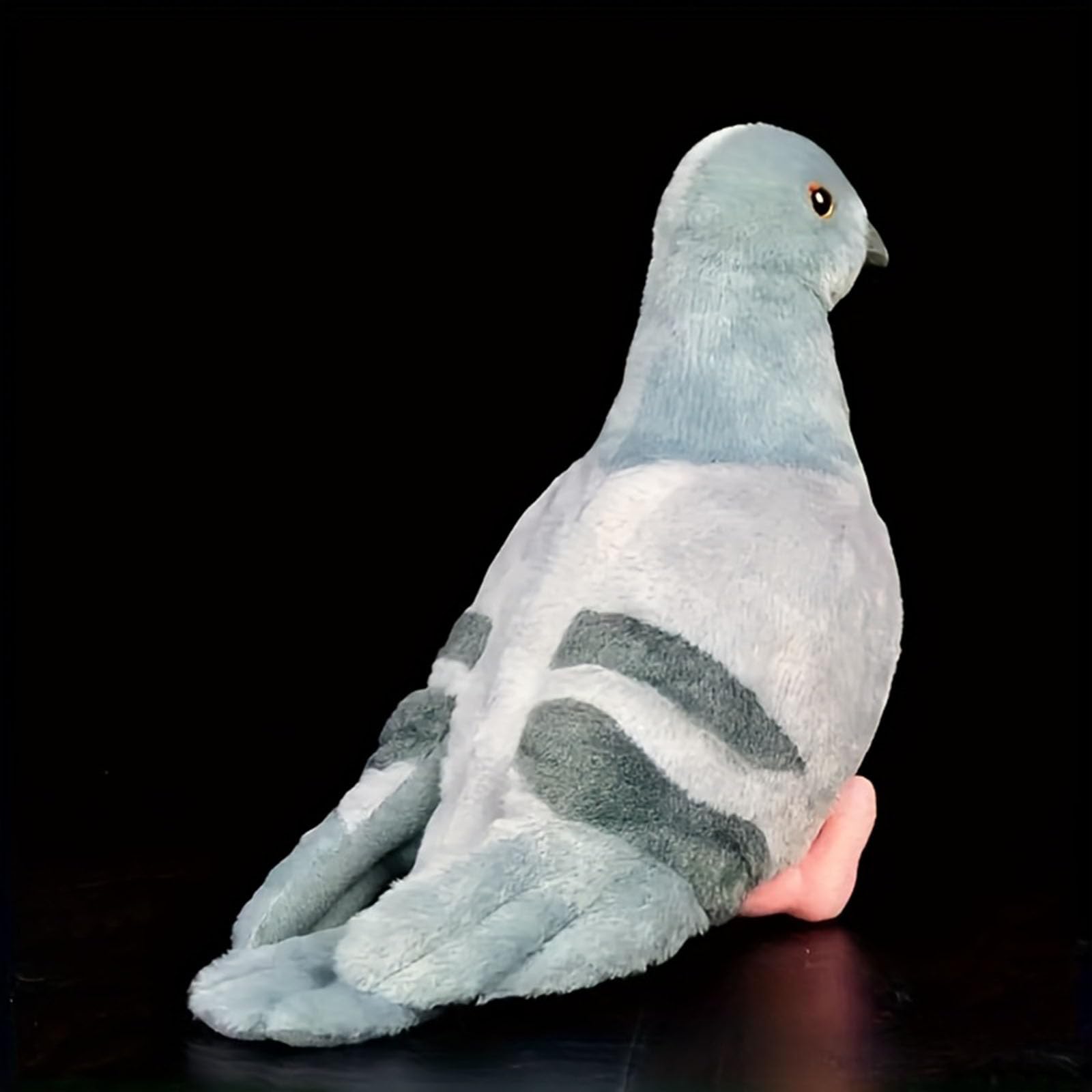 TUKVESZE Pigeon plush toy lifestyle shot with warm, comforting touch
