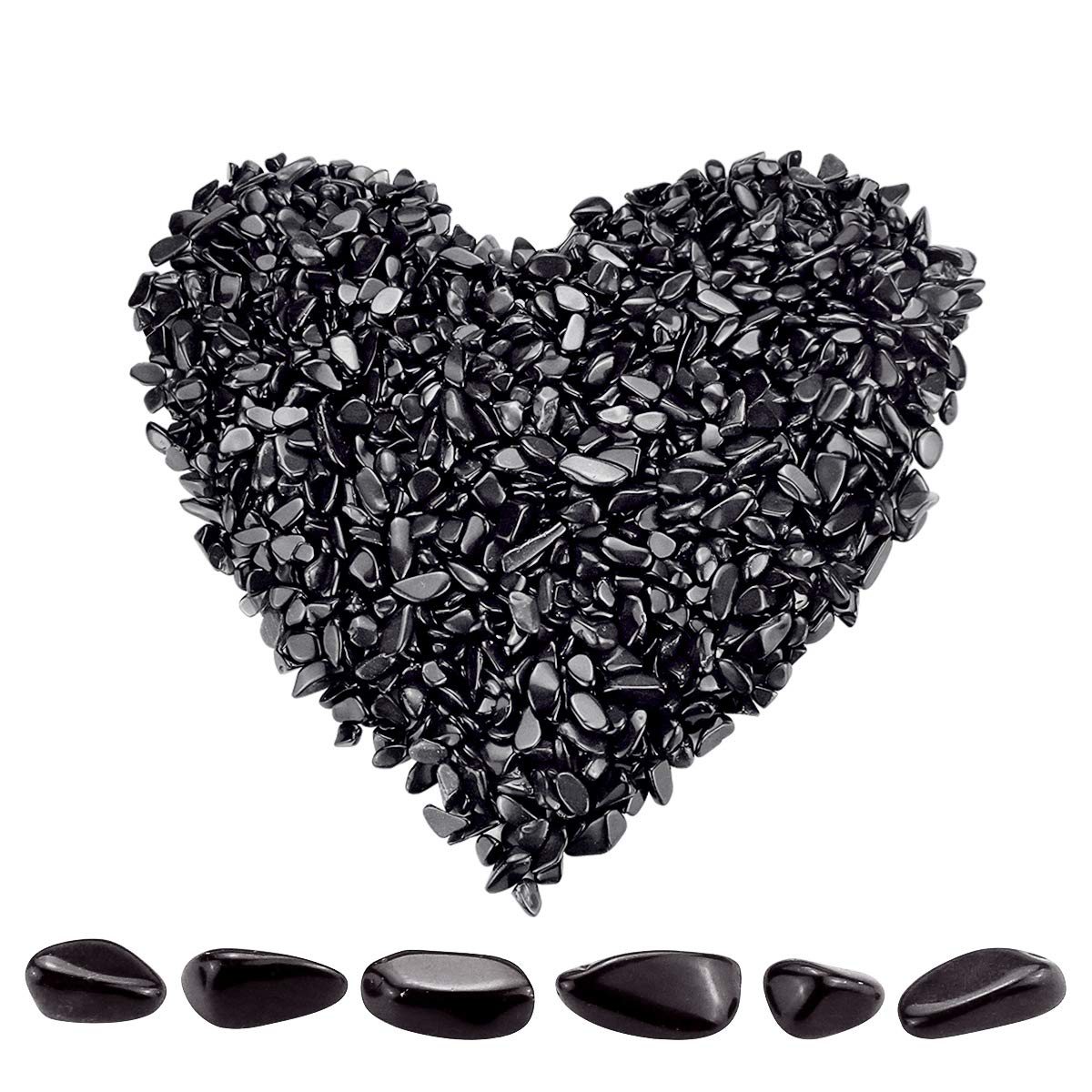 Twdrer black obsidian chips closeup showing irregular shapes for decor and crafts.