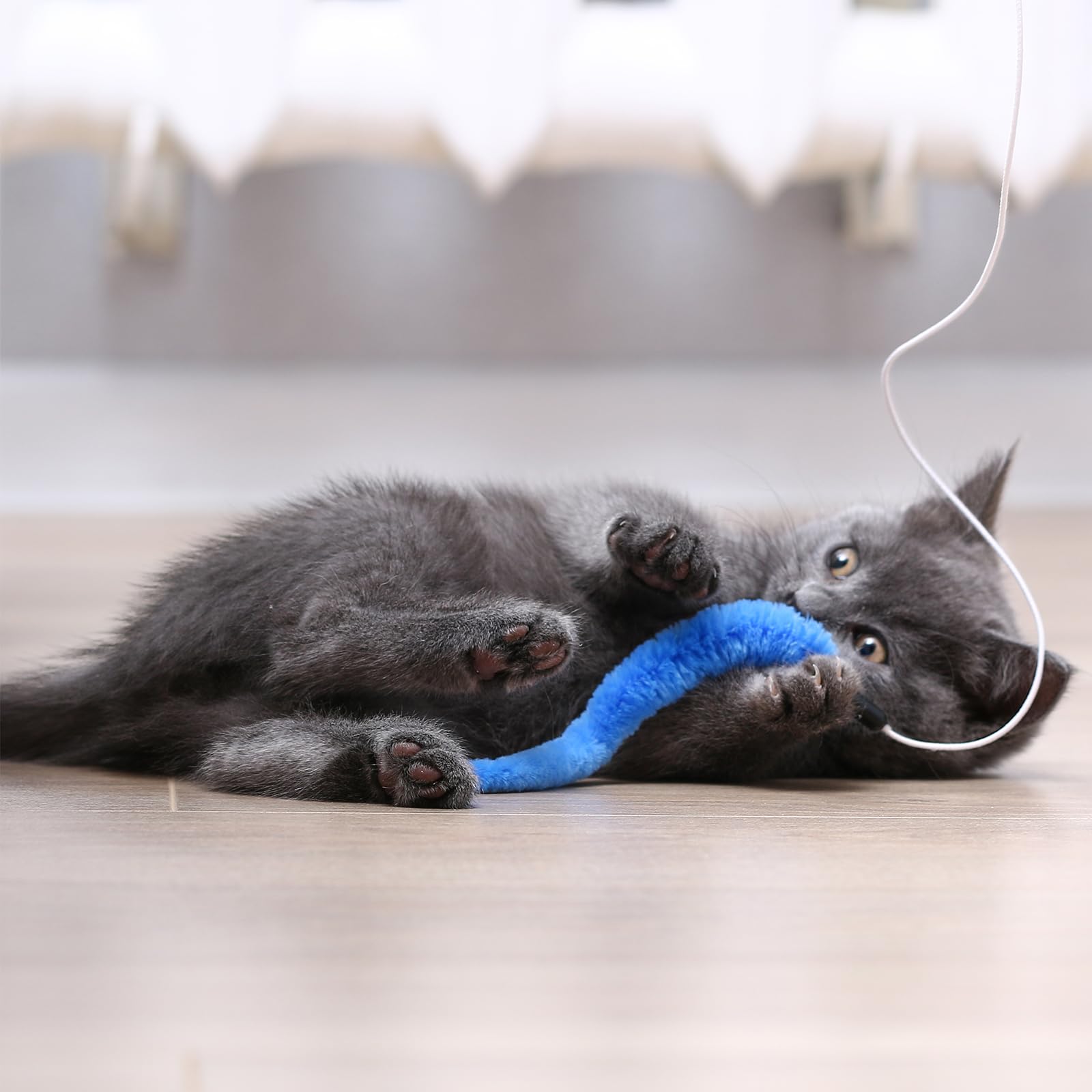 Tweruna cat worm toy clip-on teaser attachment enables quick color swaps and easy rotation