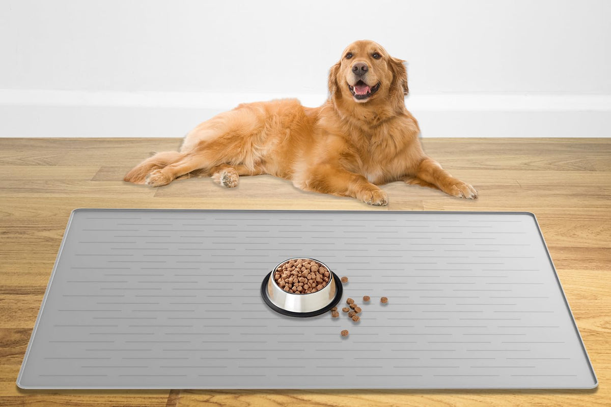 Ultibe largest pet food mat 48x32 setup with raised edges containing spills.