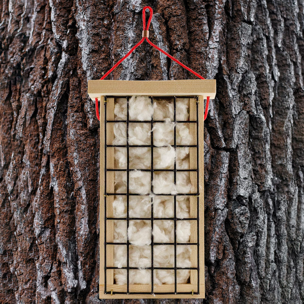 Uncle Dunkels bird nest holder lid overhang protects nesting material from rain
