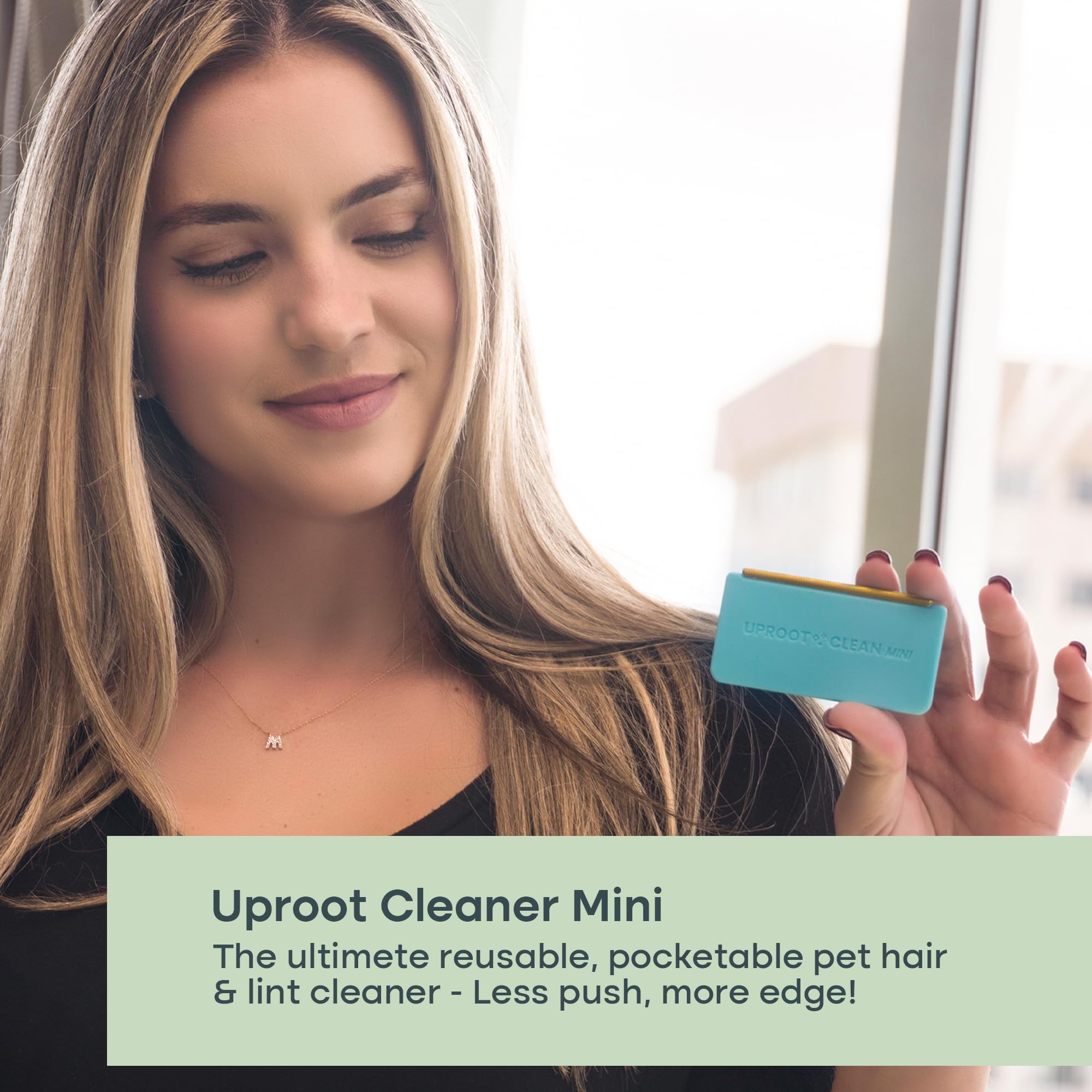 Uproot Clean Mini Pet Hair Remover two-sided edge enhances fabric-safe pickup.