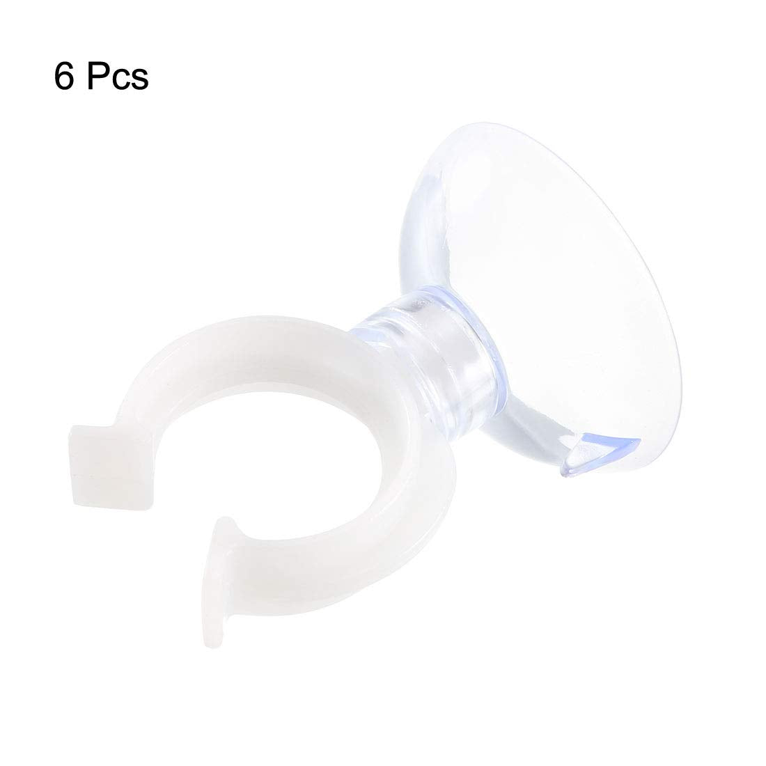Clear Uxcell suction cup blends with aquarium while holding tubing underwater