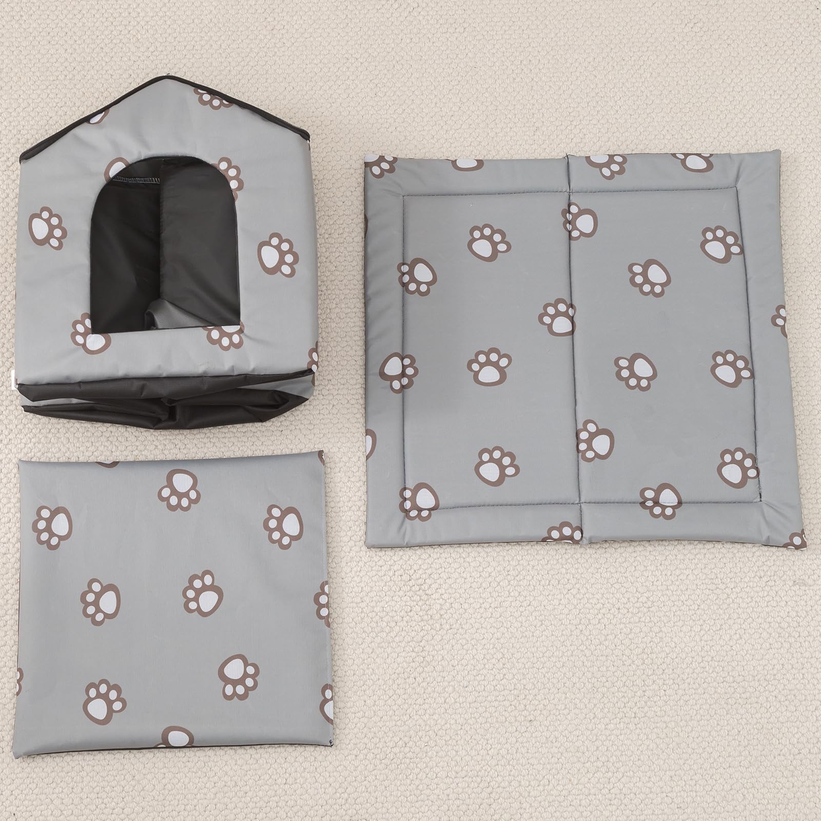 VARMTOR outdoor cat house provides rain and snow protection.
