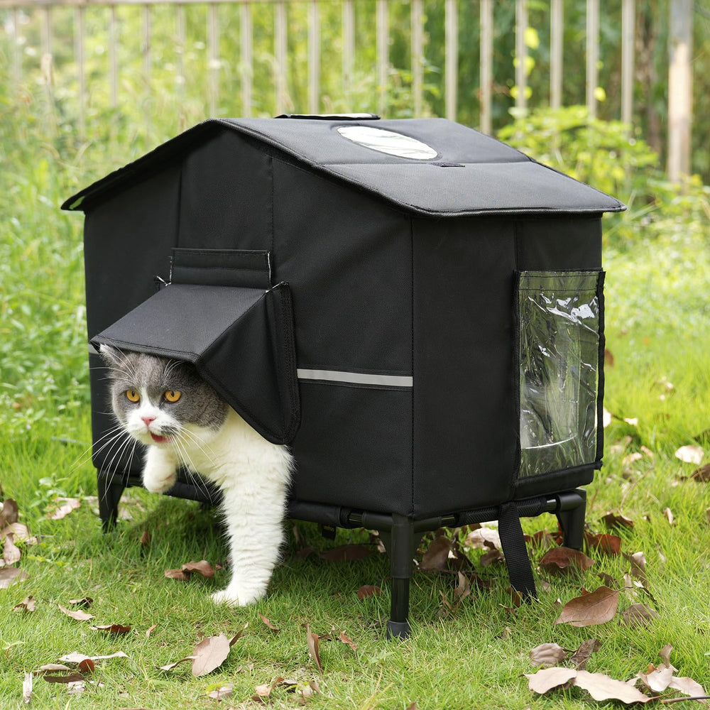 Veehoo outdoor cat house weatherproof front view highlights elevated bed for dry warmth.