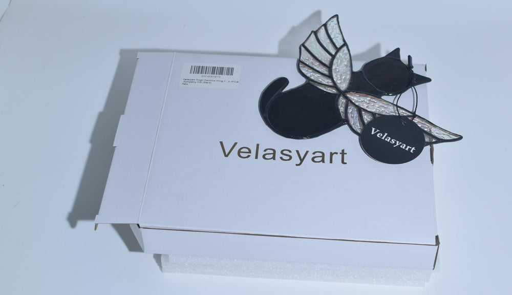 Velasyart angel-wing memorial measures 7.1 by 5.8 inches for display.