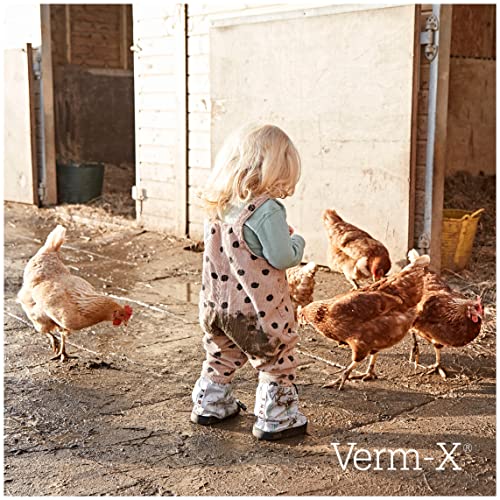 Verm-X bottle with label and measuring cup indicating precise dosing.