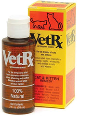 Vet RX cat remedy bottle shown warming for easy nasal drop administration.