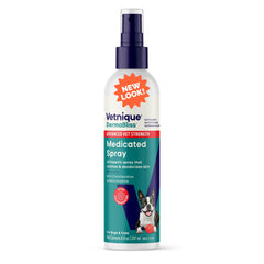Vetnique Dermabliss spray bottle closeup showing medicated formula for dog skin care.