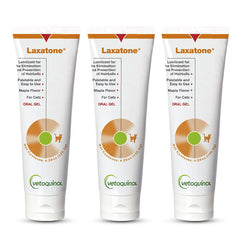 Vetoquinol Laxatone bottle pouring maple-flavored gel aids hairball passage.