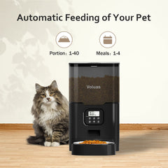 Voluas cat dry food dispenser in action dispensing a portion for a cat meal.