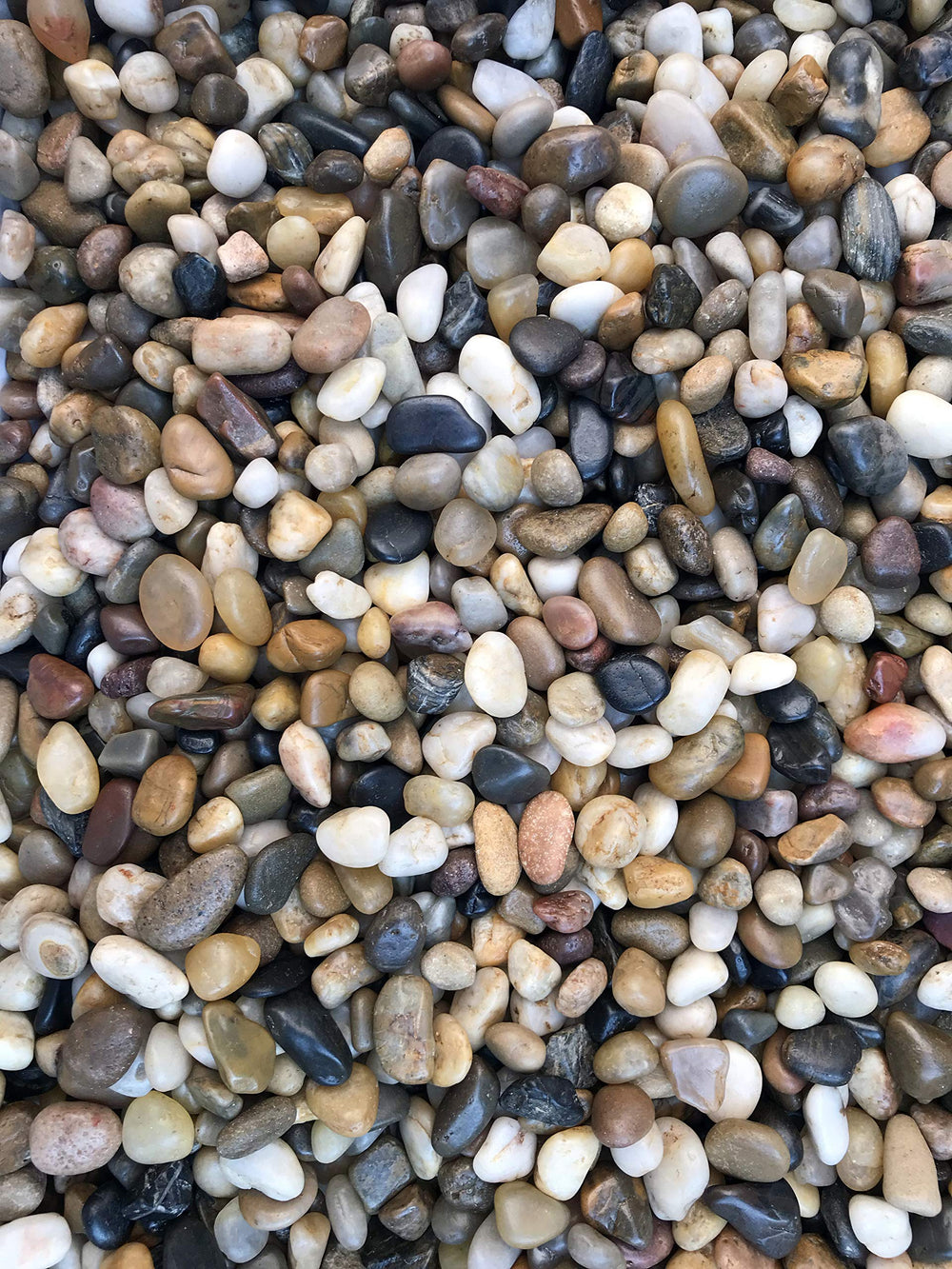 Voulosimi river rock stones natural polished mix for versatile decorative accents and plant arrangements.