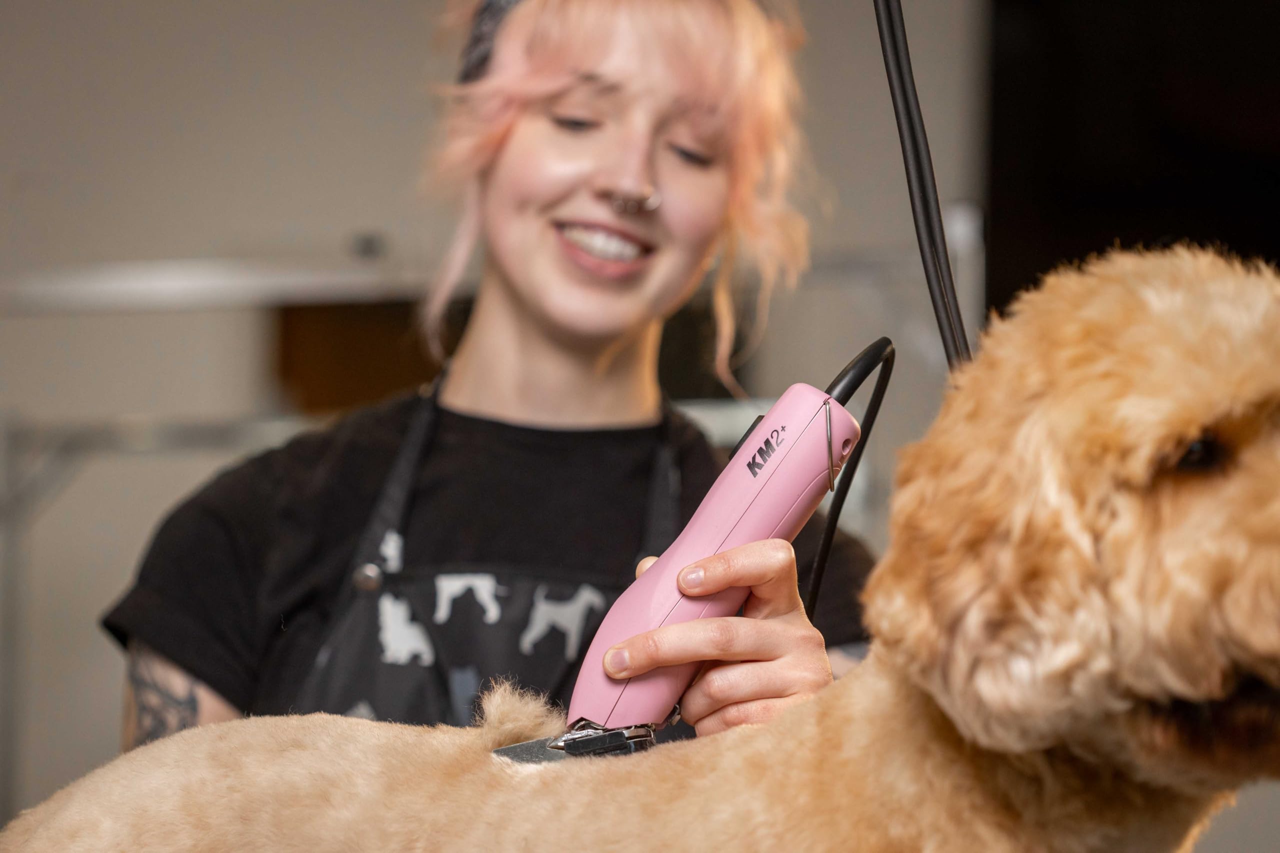 Wahl Pro Animal KM2+ pink clipper stands out for quick identification.