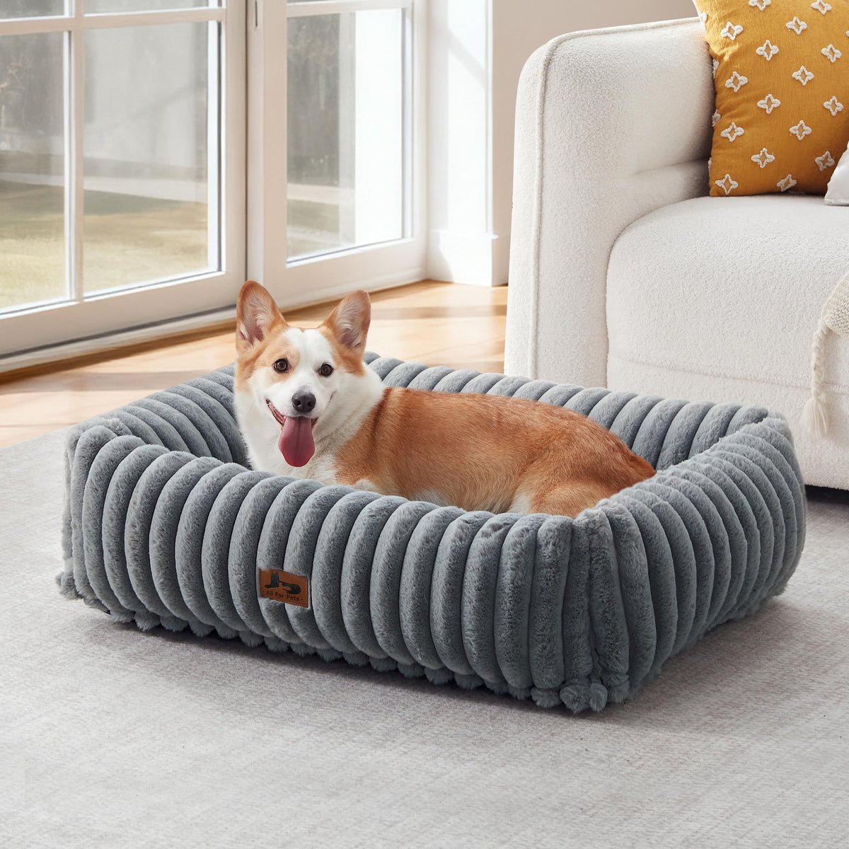 Warmrest washable dog bed with headrest supports cozy naps for pets.
