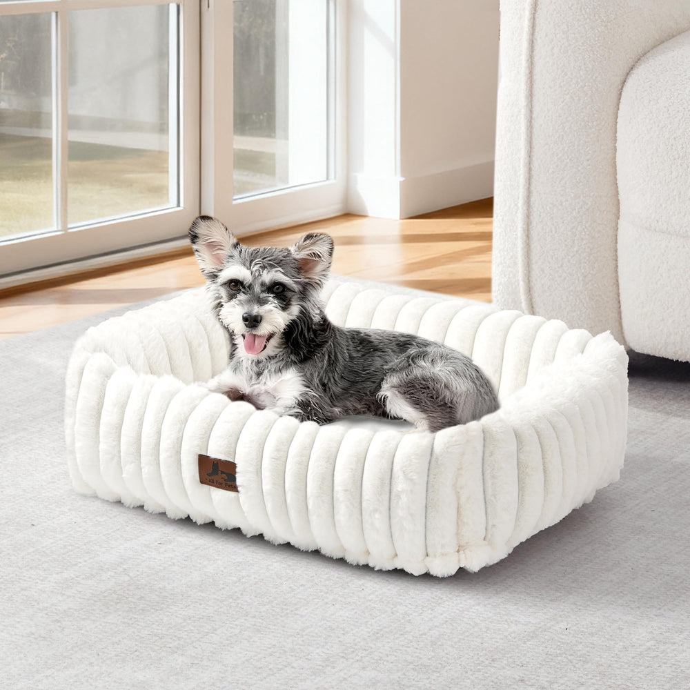 Warmrest washable dog bed rectangle side view shows supportive raised edges for neck comfort.