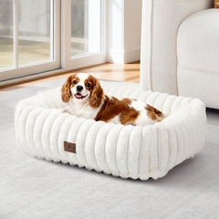 Warmrest washable dog bed side view in cream with raised edges for cozy neck support