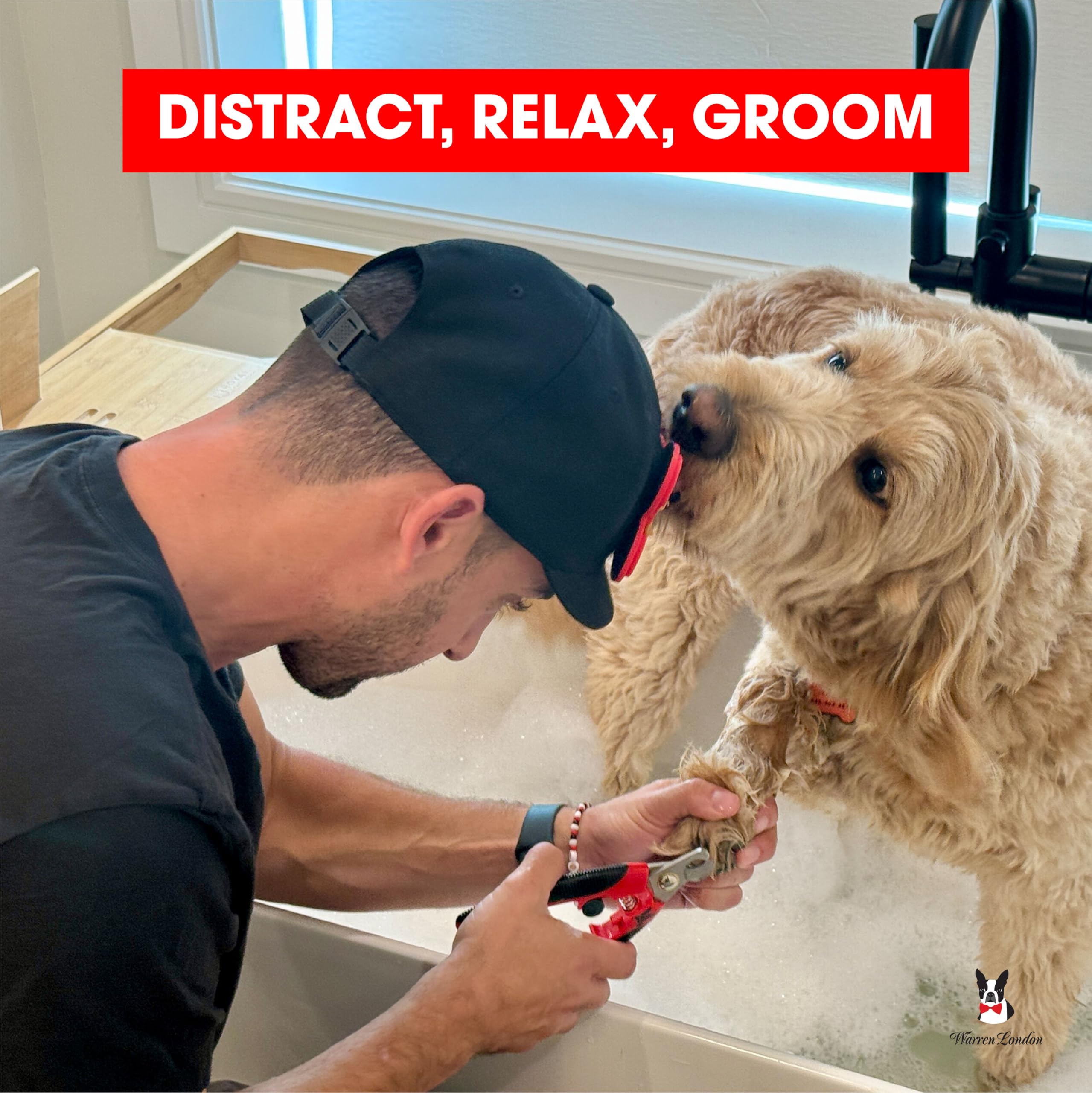 Warren London Distract-A-Hat during nail clipping for distraction.
